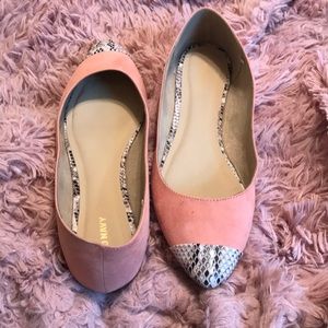 Pink flats with snake skin tip